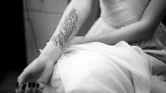 Woman arm monochrome tattoos