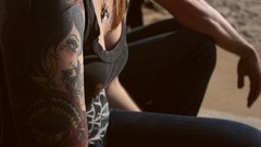 Woman arm tattoos