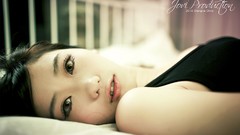 Woman asians black hair lying down