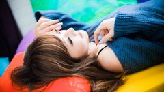 Woman asians brunettes lying down