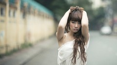 Woman asians long hair bangs