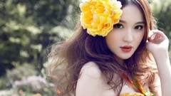 Woman asians models flower in hair