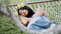 Woman asians models flower in hair