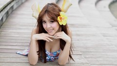 Woman asians planks brunettes models flower in hair cleavage 