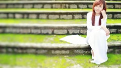 Woman asians white dress ao dai