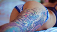 Woman ass beds legs tattoos panties