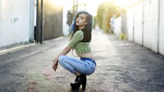 Woman ass jeans outdoors blue hair models Squatting high heels 