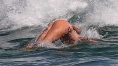 Woman ass waves bikini