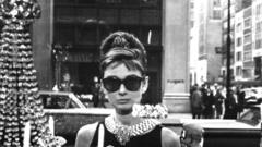 Woman Audrey Hepburn sunglasses