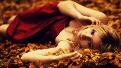 Woman autumn lying down