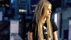 Woman Avril Lavigne blondes long hair singers blurred background