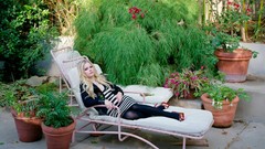 Woman Avril Lavigne lying down