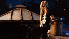 Woman Avril Lavigne sitting blondes long hair singers