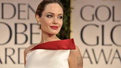 Woman Awards globe Angelina Jolie faces golden