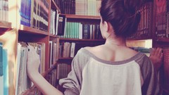 Woman back Library brunettes bookshelf