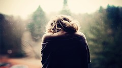 Woman back reflections bare shoulders blurred background depth 