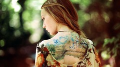 Woman back tattoos