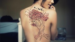 Woman back tattoos
