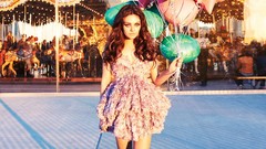 Woman Balloons Actress mila kunis models merry-go-round