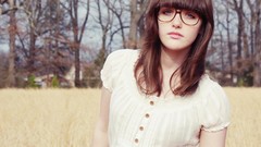 Woman bangs girls with glasses