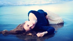 Woman Beaches brunettes lying down looking back