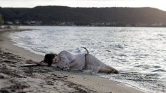 Woman Beaches lying down