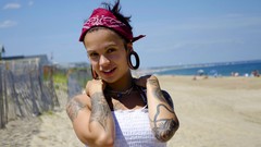 Woman Beaches tattoos smiling