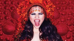 Woman Beads Selena Gomez long hair squinting singers open mouth 