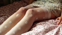 Woman beds legs stockings white stockings polka dots body parts