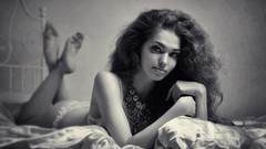 Woman beds models lying down curly hair