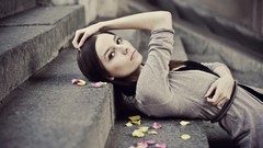 Woman belts brunettes lying down stairways