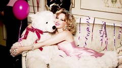 Woman bench dress Kylie Minogue blondes Australian