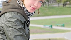 Woman bench earrings jackets blondes scarfs smiling blue eyes 