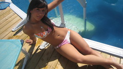 Woman bikini piercings