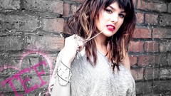 Woman biting Polish Ewa Farna