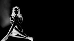 Woman black background