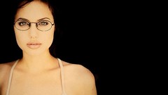 Woman black background Angelina Jolie brunettes