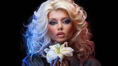 Woman black background faces blondes