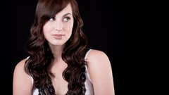 Woman black background long hair green eyes brunettes