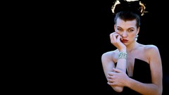 Woman black background Milla Jovovich Actress