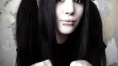 Woman black hair long ears amateurs pierced lips