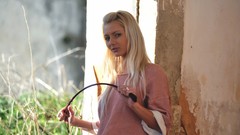 Woman blondes Annely Gerritsen riding crop