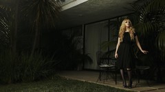 Woman blondes black dress