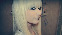 Woman blondes blue eyes piercings bangs