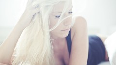 Woman blondes closed eyes cleavage