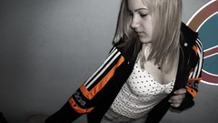 Woman blondes denim shorts selective coloring