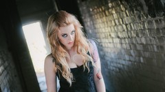 Woman blondes long hair black dress