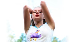 Woman blondes long hair blue eyes models ella arms raised tight 