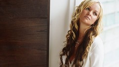 Woman blondes long hair curly hair