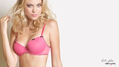 Woman blondes models bra pink lingerie